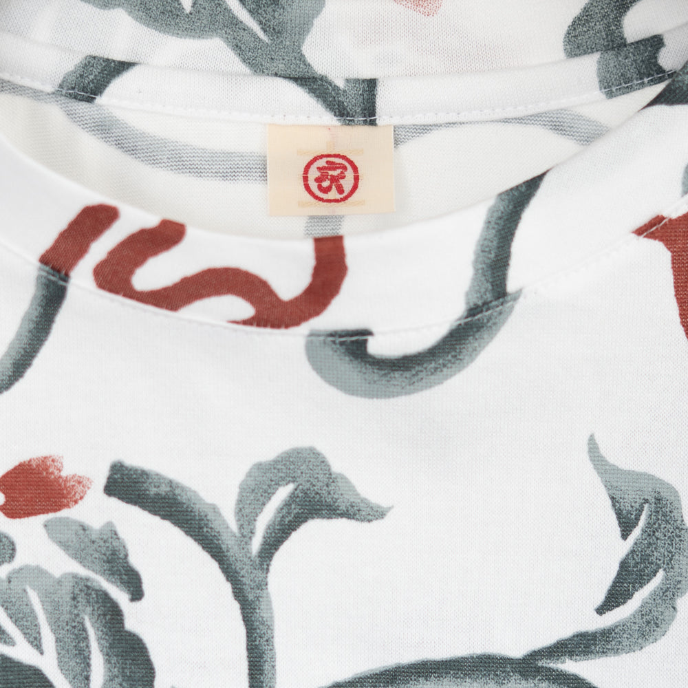 Paulownia Arabesque & Phoenix Asymmetrical Hem Tuck Tunic